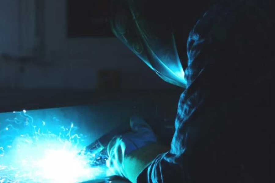 What preparations should a welder take before touching an arc?